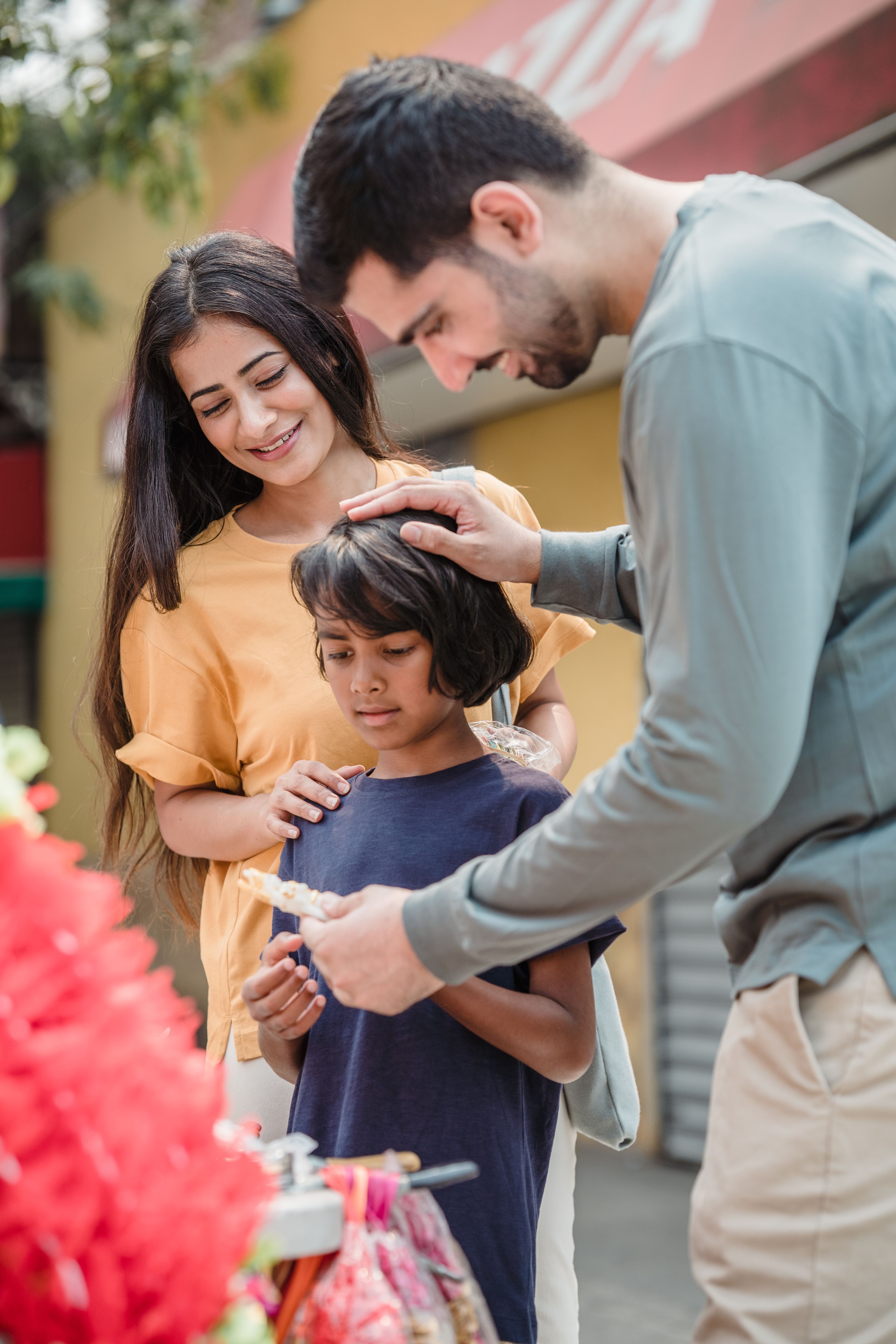Family shopping together at an outdoor market